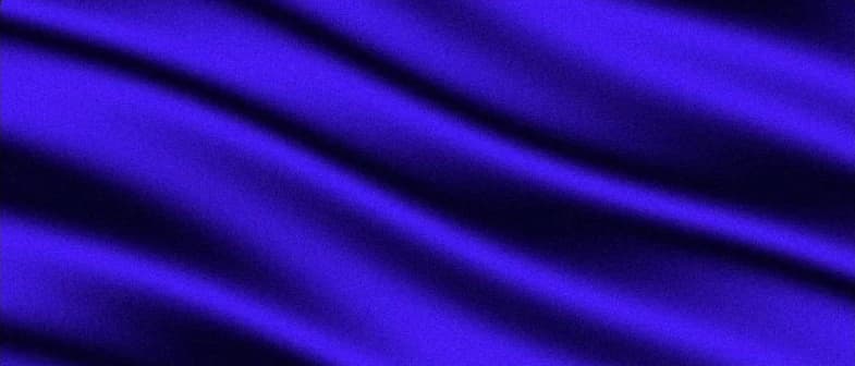The Silk background from React Bits: blue silk fabric folding slowly